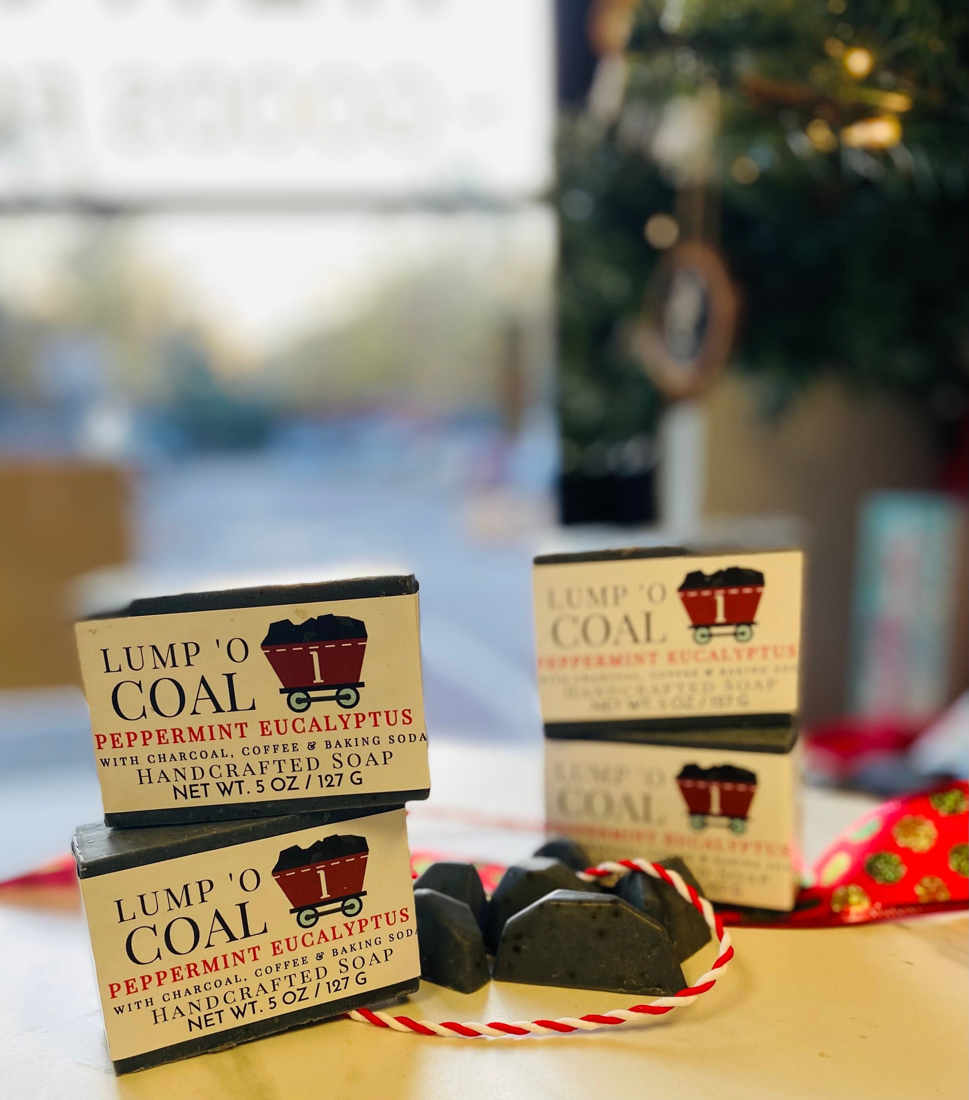 https://www.pluffmudmercantile.com/cdn/shop/products/lump-oa-coal-charcoal-handcrafted-soap-193778.jpg?v=1689541757&width=1920